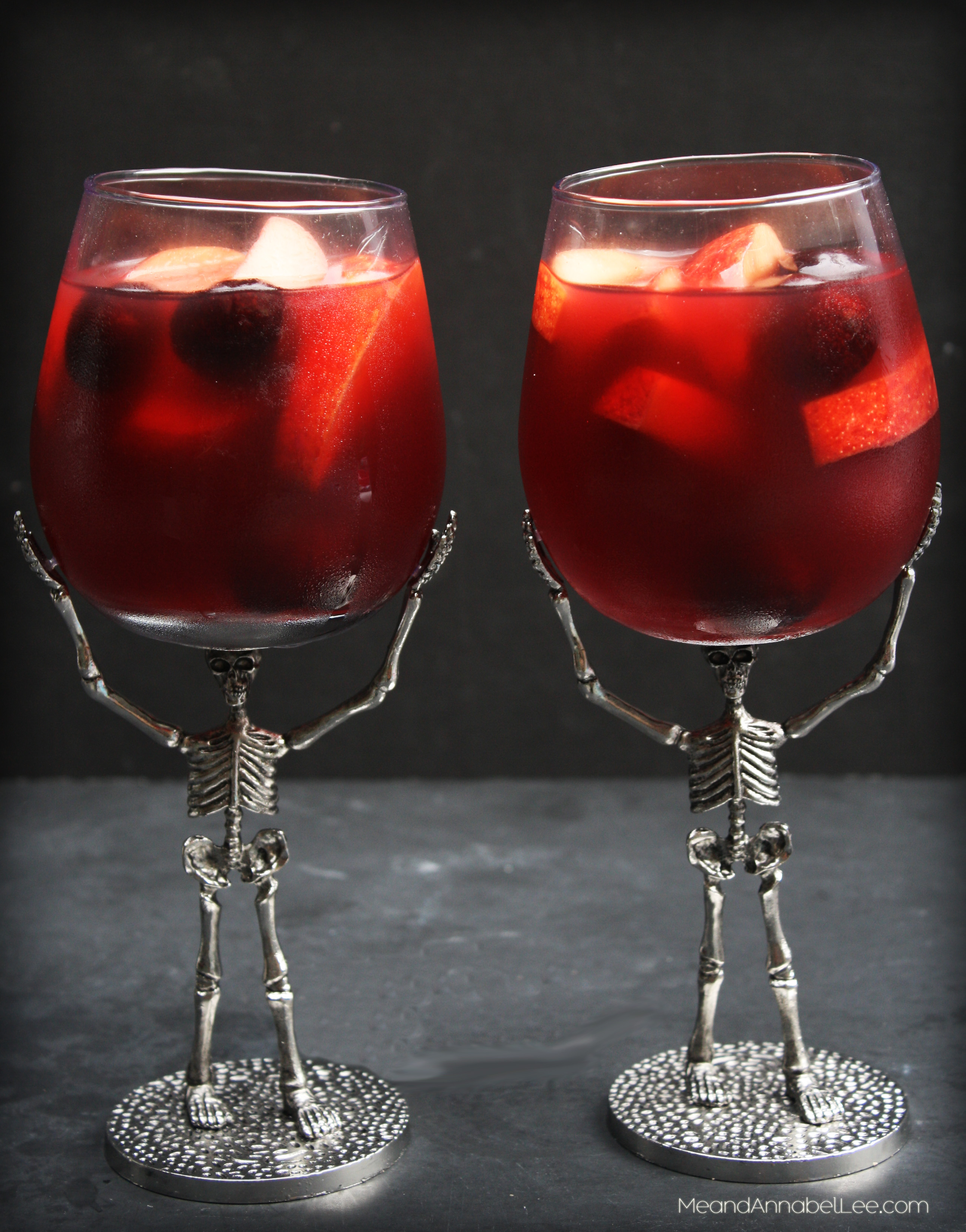 Apple Sangria....A mix of Envy Apples, Cinnamon, and Cherries make up this Fall inspired cocktail.... perfect for Halloween, Thanksgiving, or a Fall Party! - www.MeandAnnabelLee.com