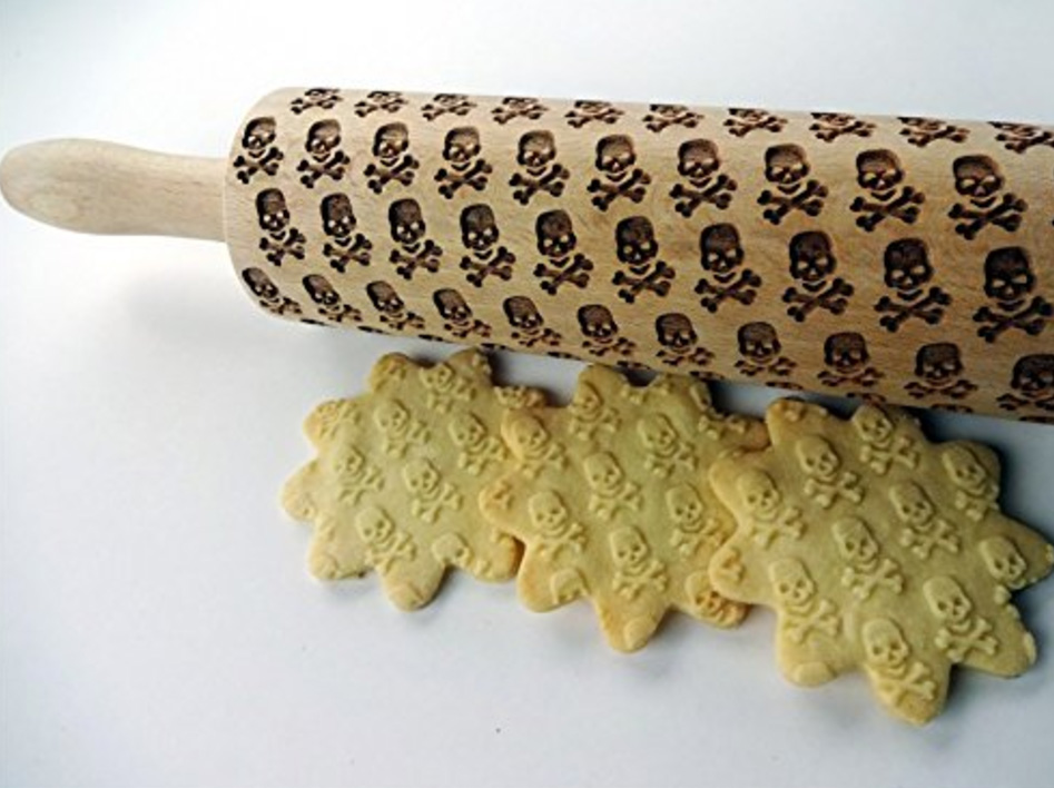Goth it yourself Embossed skull & crossbones shortbread cookies.... Skull Pattern Rolling Pin - www.MeandAnnabelLee.com - Blog for all things Dark, Gothic, Victorian, & Unusual