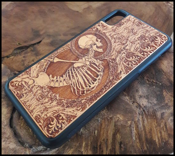20 Macabre, Twisted, Unusual, Dark, Victorian, & Gothic Stocking Stuffers and Gifts under $30 | Oddities and Curiosities | EngraversDungeon Wood Carved Skeleton Phone Case | iphone and samsung |Christmas Shopping Guide | Holiday Gift Ideas | www.MeandAnnabelLee.com