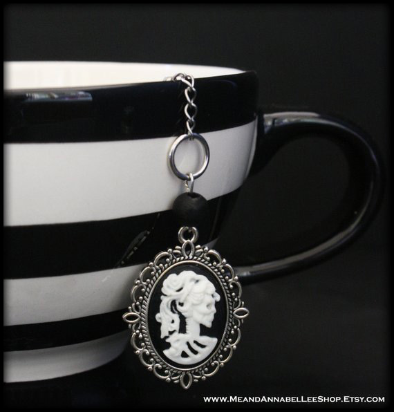20 Macabre, Twisted, Unusual, Dark, Victorian, & Gothic Stocking Stuffers and Gifts under $30 | Oddities and Curiosities | MeandAnnabelLeeShop Lady Skeleton Cameo Tea Ball Infuser |Stainless Steel Single Serve | Skulls | Christmas Shopping Guide | Holiday Gift Ideas | www.MeandAnnabelLee.com