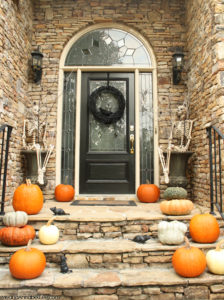 Halloween Front Door Decor - Skeletons, Pumpkins, Spider Web Branches, and Crow Grapevine Wreath - www.MeandAnnabelLee.com